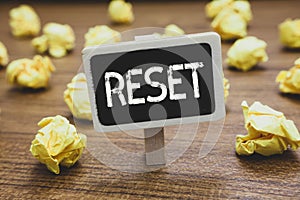 Writing note showing Reset. Business photo showcasing cause device return to its factory mode Set again zero start point
