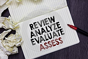 Writing note showing Review Analyze Evaluate Assess. Business photo showcasing Evaluation of performance feedback process Marker o