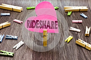 Writing note showing Rideshare. Business photo showcasing Sharing rides or transportation Carpool Online Taxi service