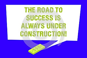 Writing note showing The Road To Success Is Always Under Construction. Business photo showcasing In continuous