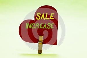 Writing note showing Sale Increase. Business photo showcasing Average Sales Volume has Grown Boost Income from Leads Clothespin ho