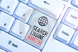 Writing note showing Search Engine Marketing. Business photo showcasing promote Website visibility on searched result