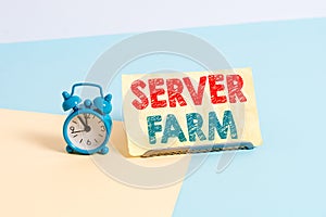 Writing note showing Server Farm. Business photo showcasing a group of computers acting as servers and housed together Alarm clock