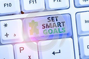 Writing note showing Set Smart Goals. Business photo showcasing Establish achievable objectives Make good business plans