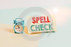 Writing note showing Spell Check. Business photo showcasing to use a computer program to find and correct spelling errors Alarm