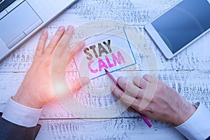 Writing note showing Stay Calm. Business photo showcasing Maintain in a state of motion smoothly even under pressure.