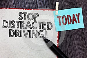 Writing note showing Stop Distracted Driving. Business photo showcasing asking to be careful behind wheel drive slowly White page photo