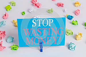 Writing note showing Stop Wasting Money. Business photo showcasing advicing demonstrating or group to start saving and