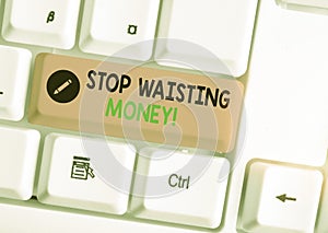 Writing note showing Stop Wasting Money. Business photo showcasing advicing demonstrating or group to start saving and use it