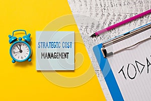 Writing note showing Strategic Cost Management. Business photo showcasing Reduce total Expenses while improving operation Notepad