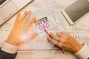 Writing note showing Super Dad. Business photo showcasing Children idol and super hero an inspiration to look upon to.