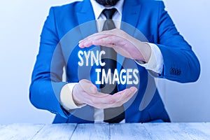 Writing note showing Sync Images. Business photo showcasing Making photos identical in all devices Accessible anywhere