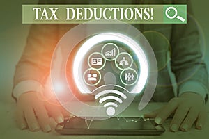 Writing note showing Tax Deductions. Business photo showcasing reduction income that is able to be taxed of expenses Picture photo