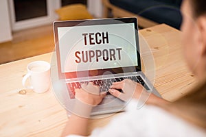 Writing note showing Tech Support. Business photo showcasing advising and troubleshooting service provided by a