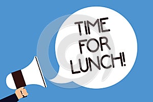 Writing note showing Time For Lunch. Business photo showcasing Moment to have a meal Break from work Relax eat drink rest Man hold