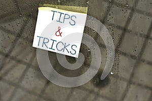 Writing note showing Tips And Tricks. Business photo showcasing Steps Lifehacks Handy advice Recommendations Skills