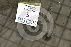 Writing note showing Tips And Tricks. Business photo showcasing Steps Lifehacks Handy advice Recommendations Skills photo