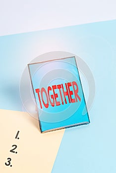 Writing note showing Together. Business photo showcasing In proximity,union or collison with another demonstrating or