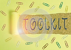 Writing note showing Toolkit. Business photo showcasing set of tools kept in a bag or box and used for a particular