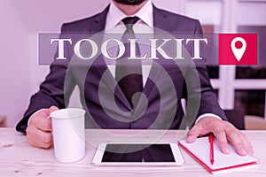 Writing note showing Toolkit. Business photo showcasing set of tools kept in a bag or box and used for a particular