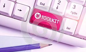 Writing note showing Toolkit. Business photo showcasing set of tools kept in a bag or box and used for a particular