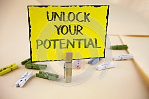 Writing note showing Unlock Your Potential. Business photo showcasing Reveal talent Develop abilities Show personal skills writte