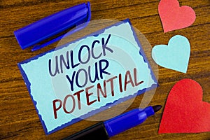 Writing note showing Unlock Your Potential. Business photo showcasing Reveal talent Develop abilities Show personal skills writte