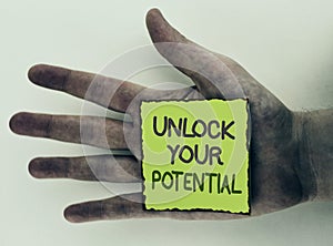 Writing note showing Unlock Your Potential. Business photo showcasing Reveal talent Develop abilities Show personal skills writte