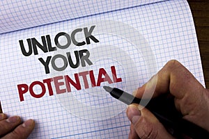 Writing note showing Unlock Your Potential. Business photo showcasing Reveal talent Develop abilities Show personal skills writte