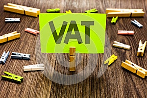 Writing note showing Vat. Business photo showcasing Consumption tax levied on sale barter for properties and services Clips art bo