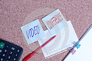 Writing note showing Video Conference. Business photo showcasing showing in remote places hold facetoface meetings Desk