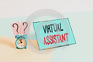 Writing note showing Virtual Assistant. Business photo showcasing demonstrating who provides various services to photo