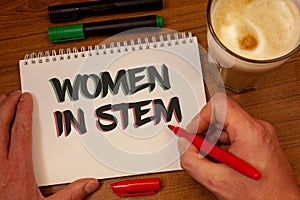 Writing note showing Women In Stem. Business photos showcasing Science Technology Engineering Mathematics Scientist Research