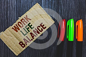 Writing note showing Work Life Balance. Business photo showcasing Division of time between working or family and leisure Cardboard