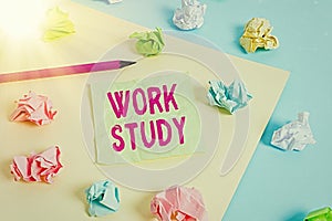Writing note showing Work Study. Business photo showcasing college program that enables students to work parttime Colored crumpled