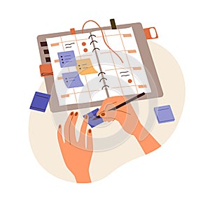 Writing plans on sticky memo notes, making schedule in paper planner, notebook. Hands with pen and personal timetable