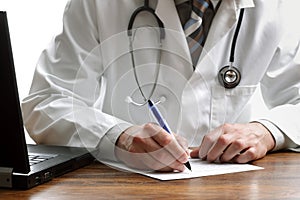 Writing a prescription or medical examination photo