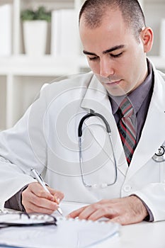 Writing a prescription or medical examination notes