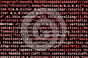 Writing programming code on laptop. Digital binary data on computer screen