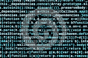 Writing programming code on laptop. Digital binary data on computer screen