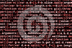 Writing programming code on laptop. Digital binary data on computer screen