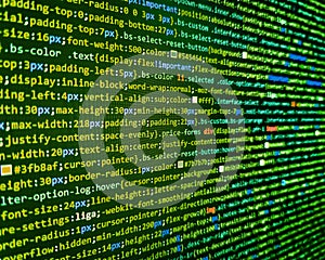 Writing programming functions on laptop. Abstract computer script source code. Application web source code on monitor. Abstract