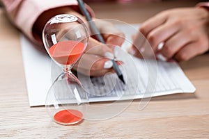 Writing a test in a short time. Students hands to take exams, write an examination room with a pencil holding on the optical form