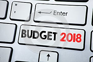 Writing text showing Budget 2018. Business concept for Household budgeting accounting planning written on white keyboard key with