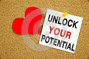 A writing text showing concept of Unlock Your Potential made on sticky note handwritten letters words for Self-Development Improve