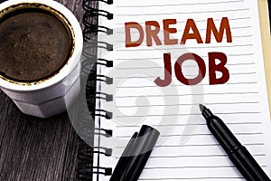 Writing text showing Dream Job. Business concept for Dreaming About Career written on notebook book note paper on the wooden wood