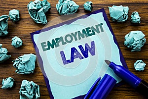 Writing text showing Employment Law. Business concept for Employee Legal Justice Written on sticky note paper, wooden background w