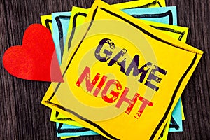 Writing text showing Game Night. Concept meaning Entertainment Fun Play Time Event For Gaming written on Stikcy Note Paper on the