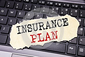 Writing text showing Insurance Plan. Business concept for Health Life Insured written on sticky note paper on the black keyboard b