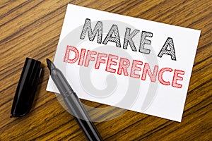 Writing text showing Make A Difference. Business concept for Motivation Success written on sticky note paper on the wooden backgro